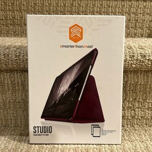 New in box IPad purple case